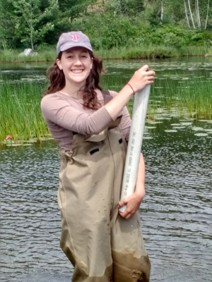 Molly with a short sediment core sample.