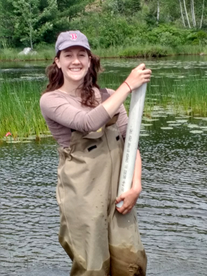 Molly with a short sediment core sample.